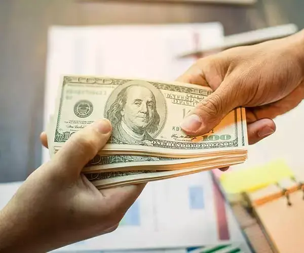 Cash Payout handed to Seller of Jewelry